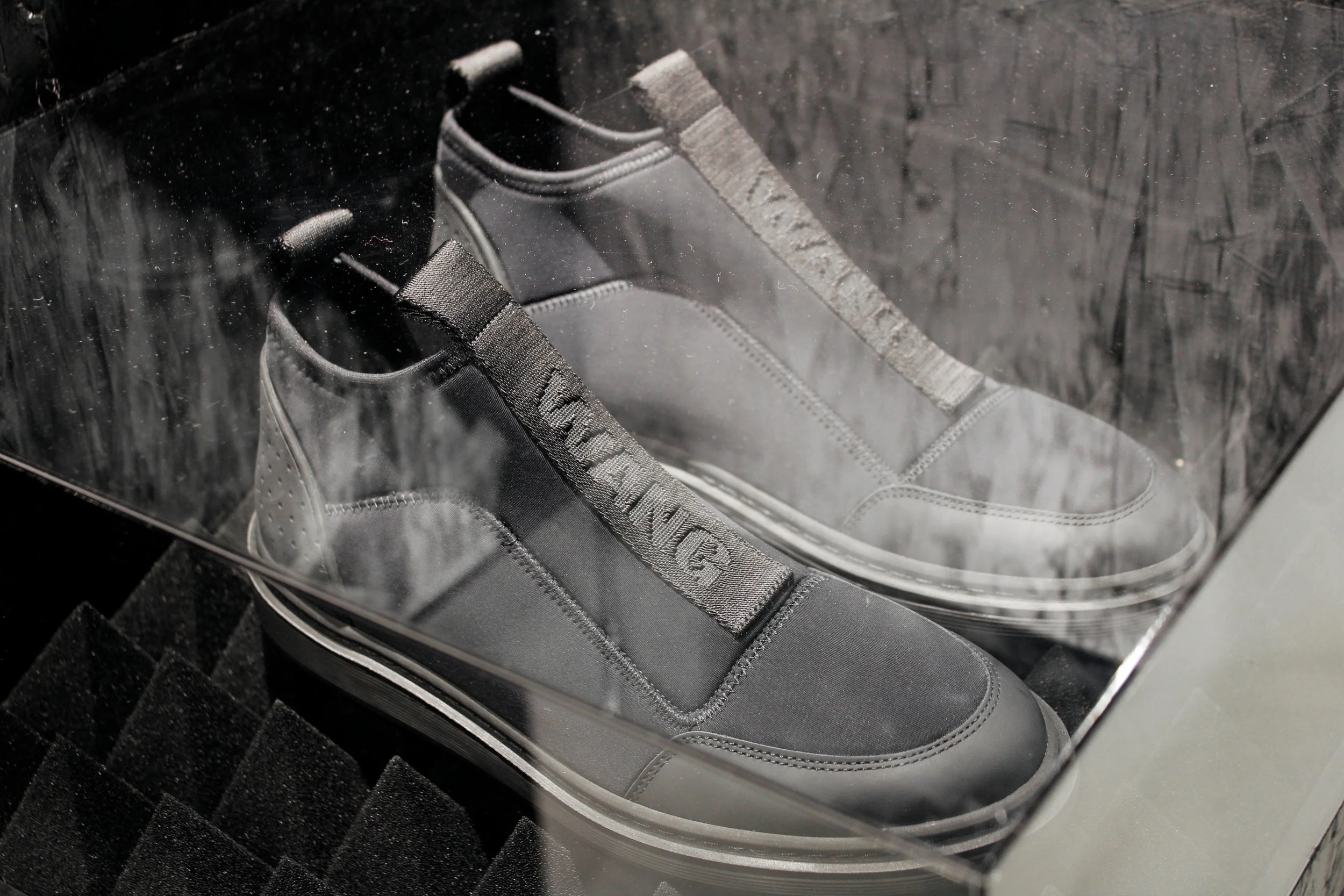 Hybrid black scuba sneaker with logo stamped reflective zips