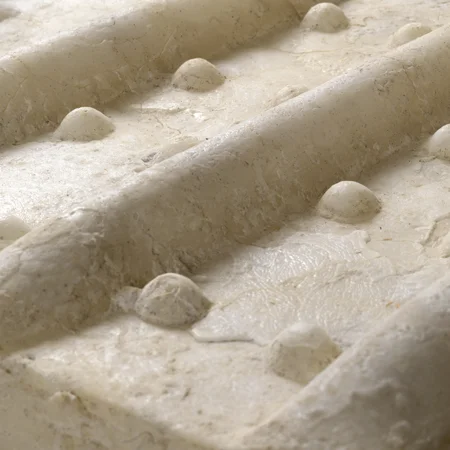 IMAGE: Dave Cole, Salt Print (La Somme, 1916) IV , 2010-2013, pure sodium chloride (table salt) heated to liquid state and crucible-poured into impressions from the tracks of the first military tank, 26 x 36 x 22 inches. Image: Stewart Clements Photography