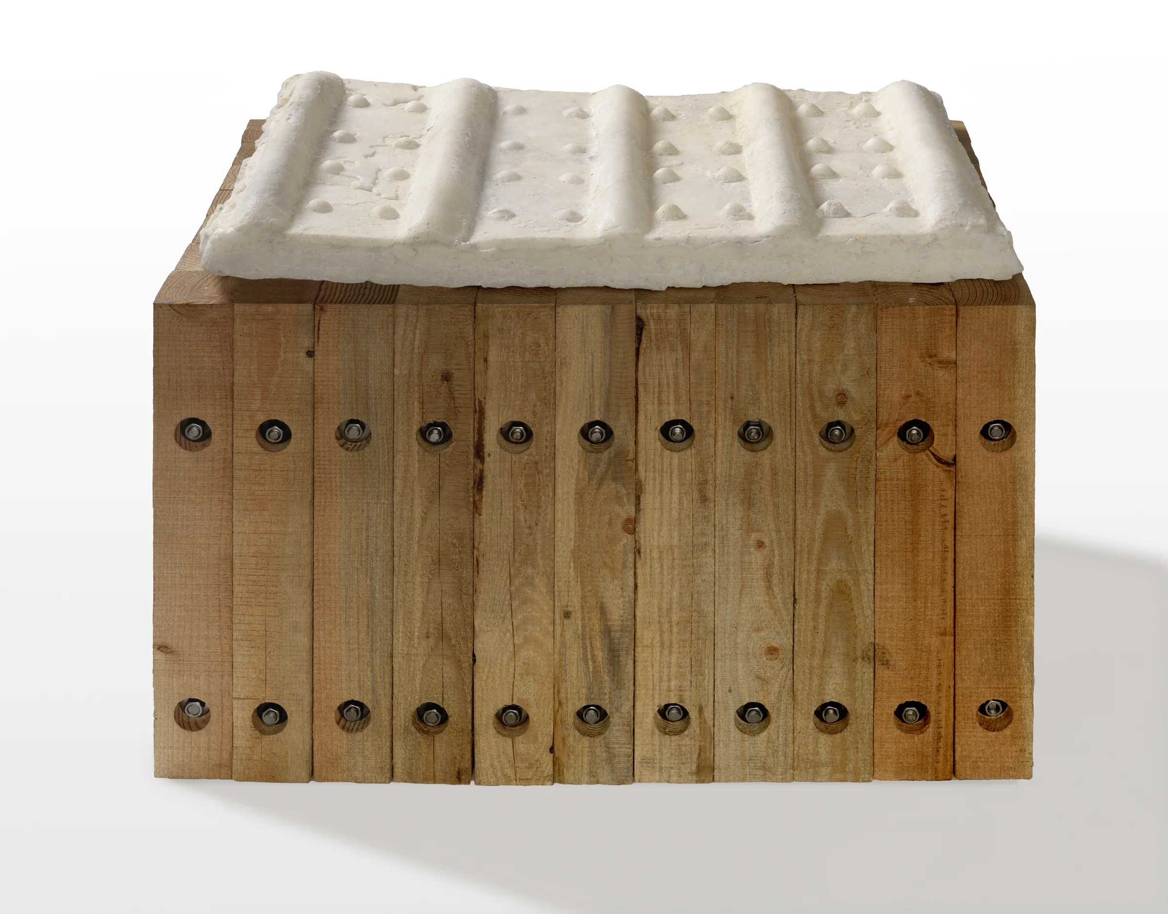 pure sodium chloride (table salt) heated to liquid state and crucible-poured into impressions from the tracks of the first military tank, 26 x 36 x 22 inches. Image: Stewart Clements Photography