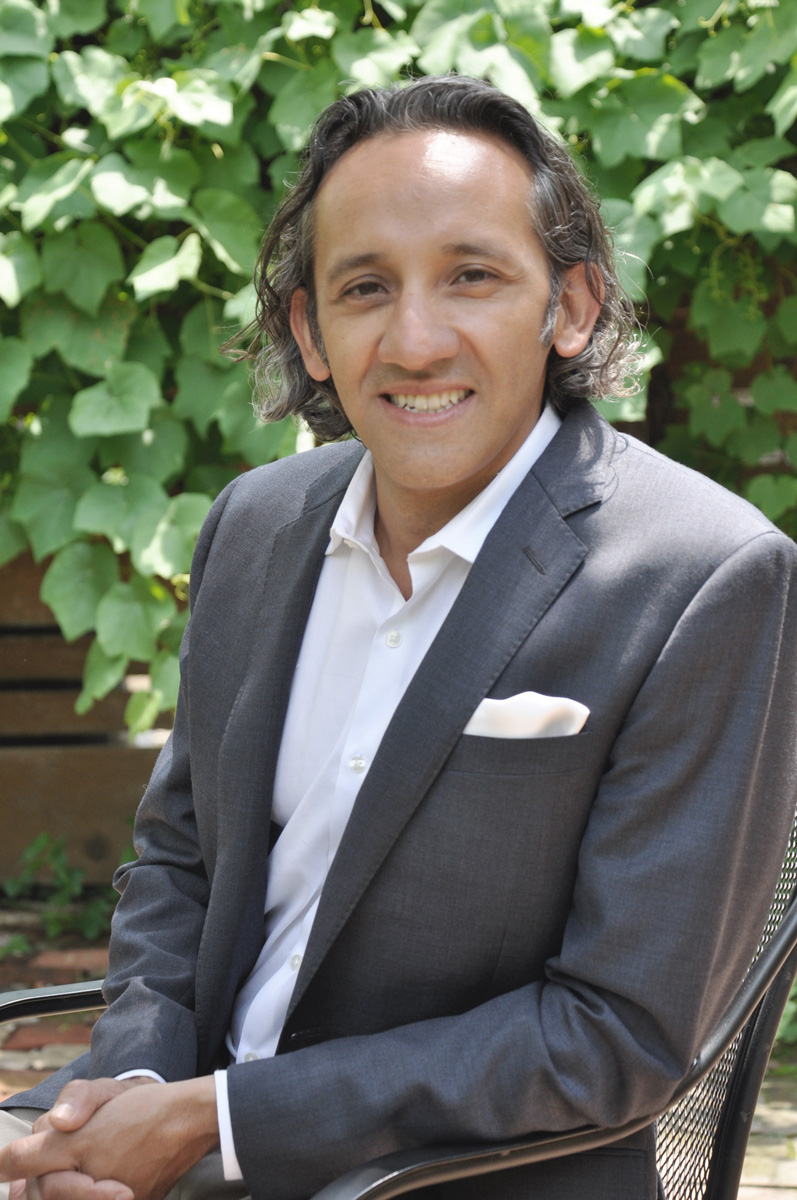 Richard Olaya , AIA, Principal Richard Olaya is the Principal and founder of Olaya Studio. Rich has been in the architecture field for over 25 years and has been a registered architect in Pennsylvania since 2005. His extensive experience of project types ranges from museums to university buildings and high rise multi-family buildings. Born in Bogota, Colombia, Rich’s multi-cultural background provide clients with a unique global and cosmopolitan perspective. As a Philadelphia resident for over 25 years, Rich also provides an intimate understanding of the region’s history and context. As a way to keep the creative juices flowing within the office, Rich likes to schedule the occasional field trip with the whole office to visit an artist’s studio, take in a nearby lecture, or have an impromptu happy hour on the front porch of the house. Rich, along with his teen age boys have been residents of University City for the last 15 years. He’s an active member in his community volunteering and contributing his time towards various arts organizations in neighborhood. One of Rich’s interests out of the office includes training for and participating in Olympic distance triathlons. A recent discovery of the sport has become a source of great joy, a few aches, and diverted what could have very well been a serious mid-life crisis. 