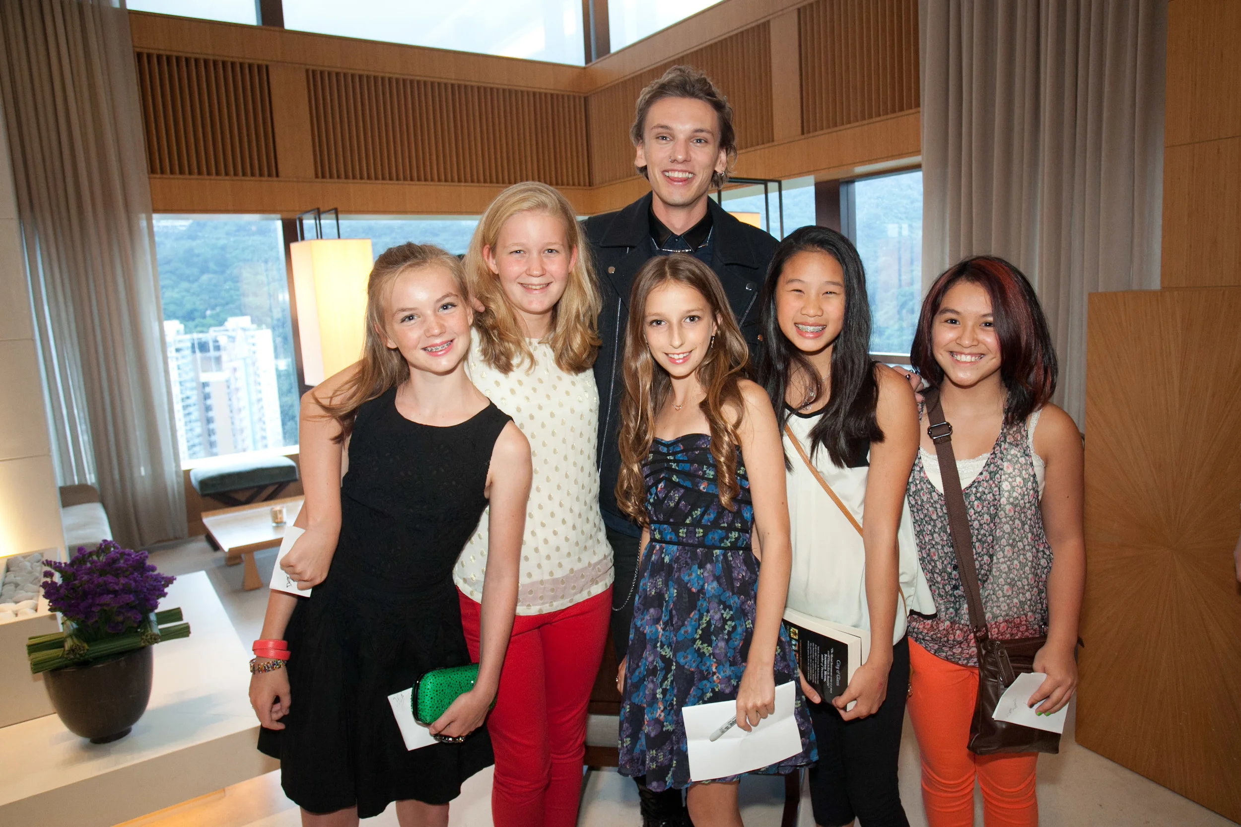 Jamie Campbell Bower and some young guests