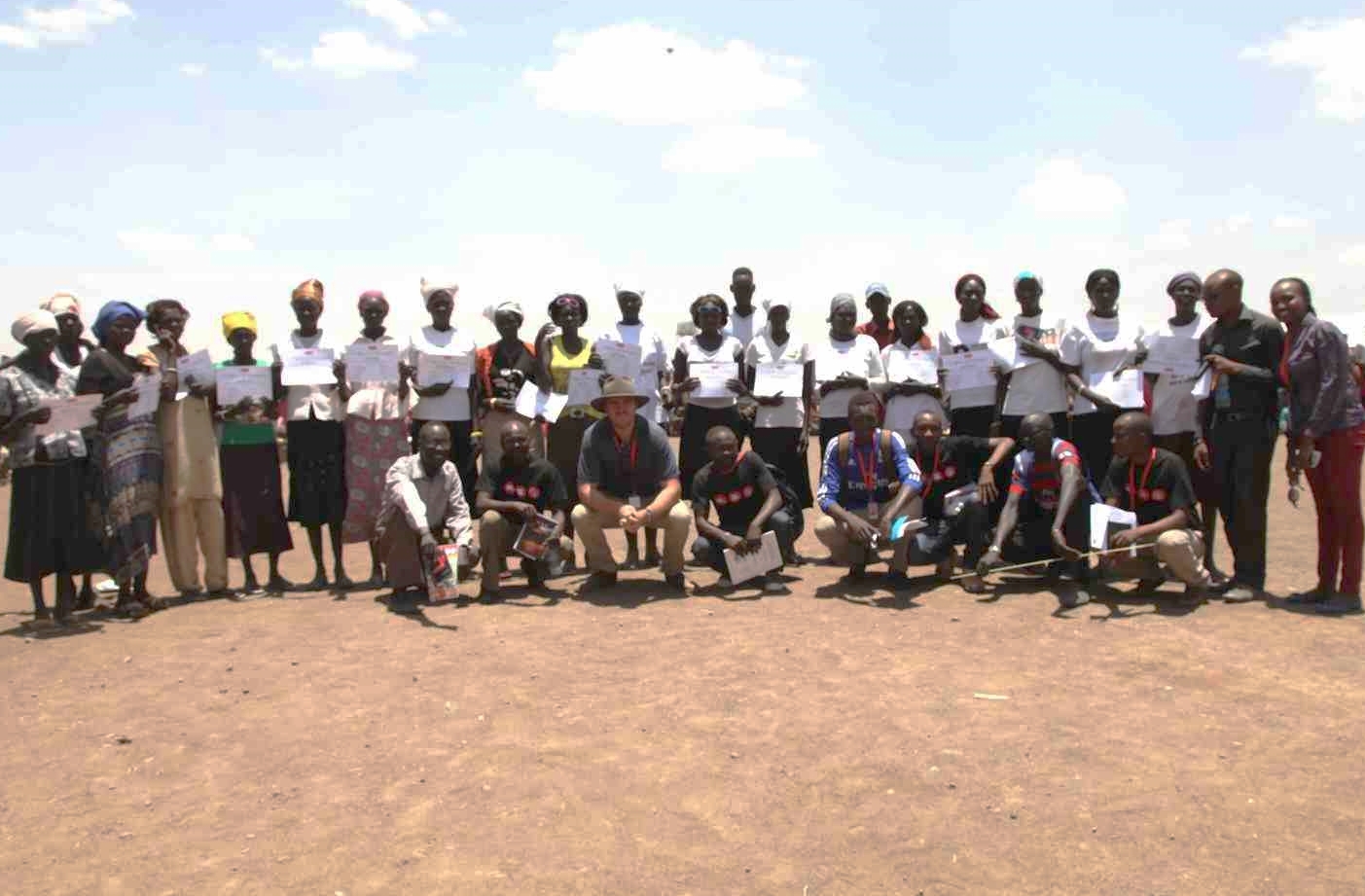 Issuing certificates to a women's group after completing a Health Course, Kakuma 2015