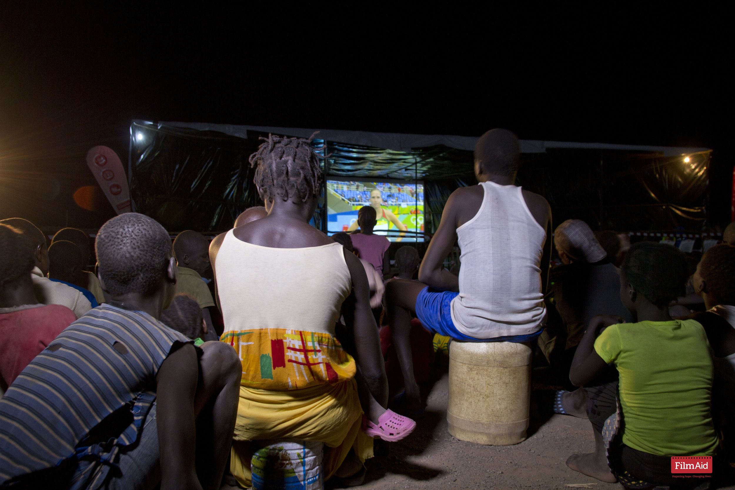 Community watches The Olympic Games - Kakuma - ©FilmAid/Otieno