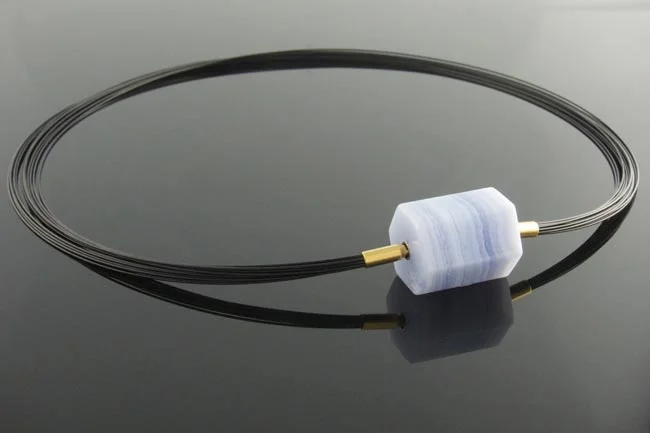 Black steel multistrand necklace with interchangeable Chalcedony barrel feature clasp