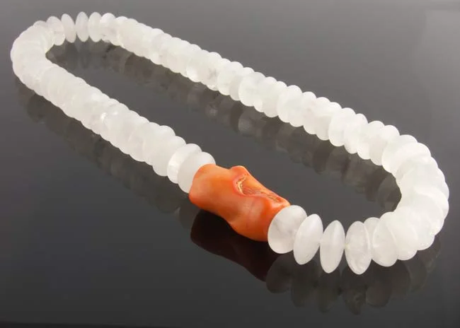 Matte rock crystal rondelle necklet with interchangeable orange bamboo coral clasp