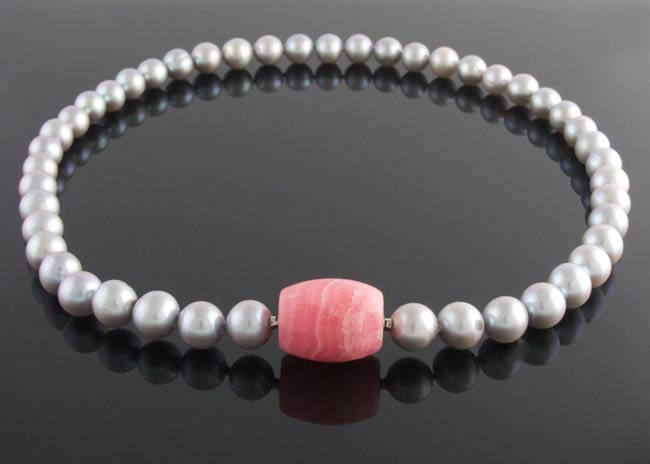 Grey freshwater pearl necklace with rhodochrosite feature clasp