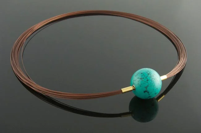 Brown wire multistrand necklace with dyed turquoise magnesite ball clasp