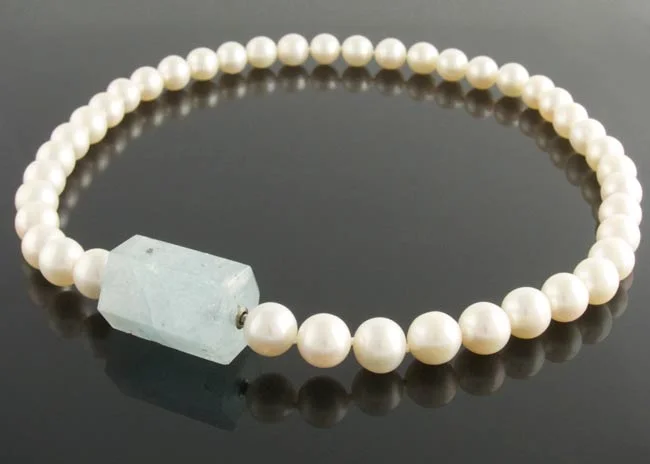 Aquamarine on cream freshwater pearls.jpg