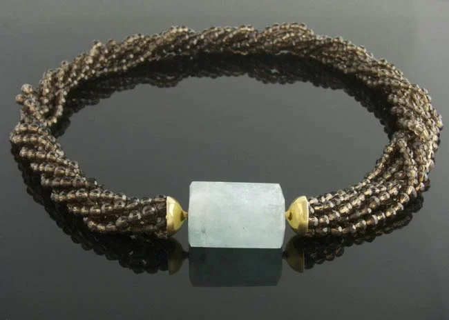Aquamarine on smoky squartz multistrand.jpg