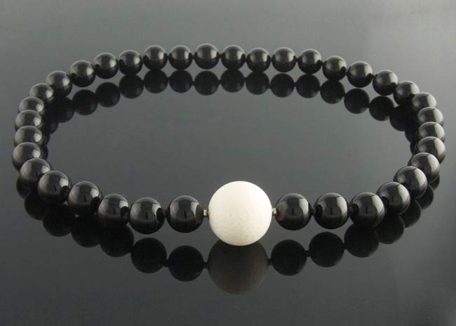 12mm black onyx necklace with white coral feature clasp