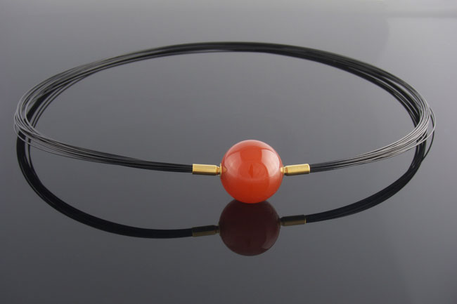 Black wire multistrand necklace with interchangeable carnelian feature clasp