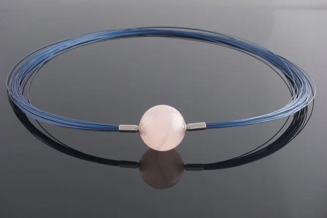 Blue steel multistrand necklace with rose quartz feature clasp