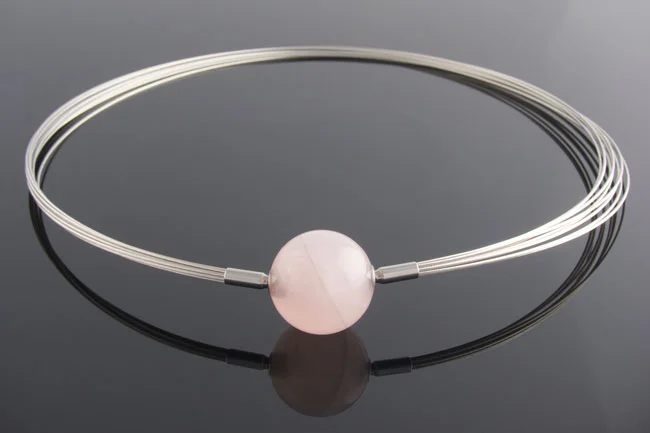 Steel multistrand necklace with interchangeable rose quartz feature clasp