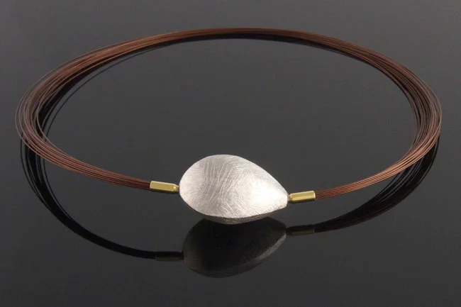 Three sided silver clasp on brown wire multistand necklace.jpg