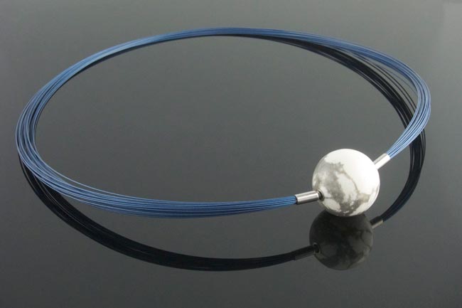 Howlite ball clasp on blue wire multistrand necklace.jpg