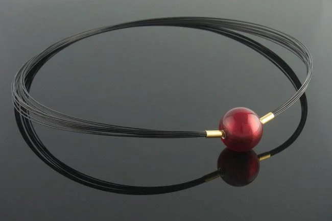 Black steel multistrand necklace with interchangeable red murano glass ball clasp