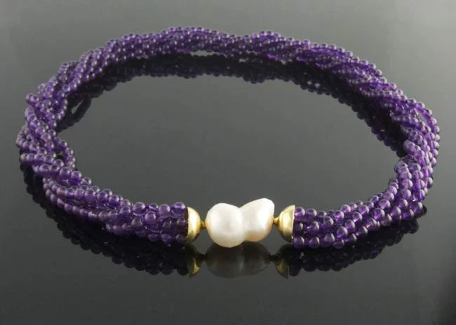 Keshi pearl clasp on amethyst multistrand necklace.jpg