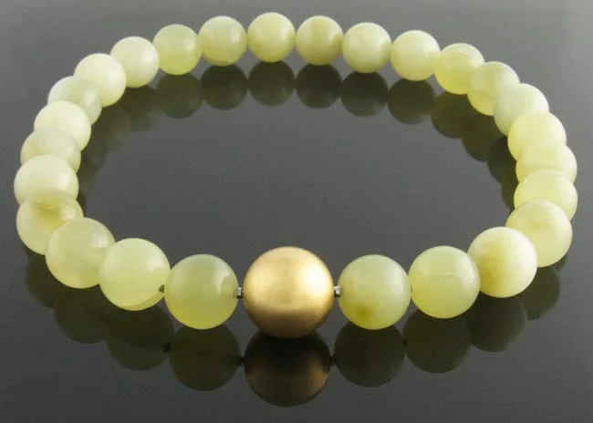 Serpentine neclace with gold ball clasp.jpg