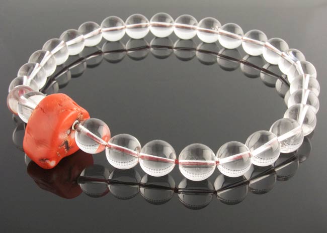 Clear quartz necklace with interchangeable red coral clasp
