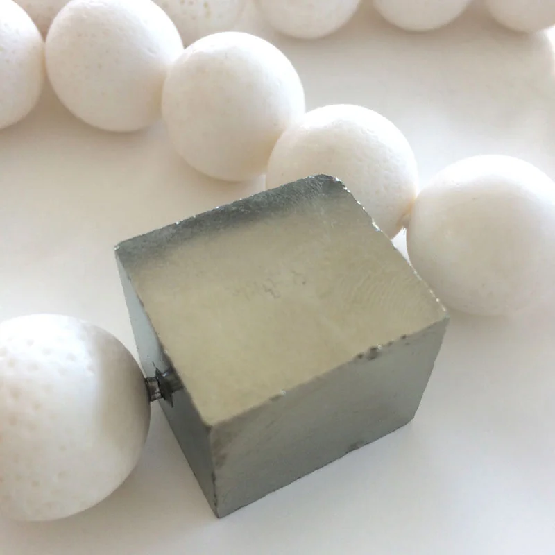 Pyrite cube clasp on white coral double length necklace