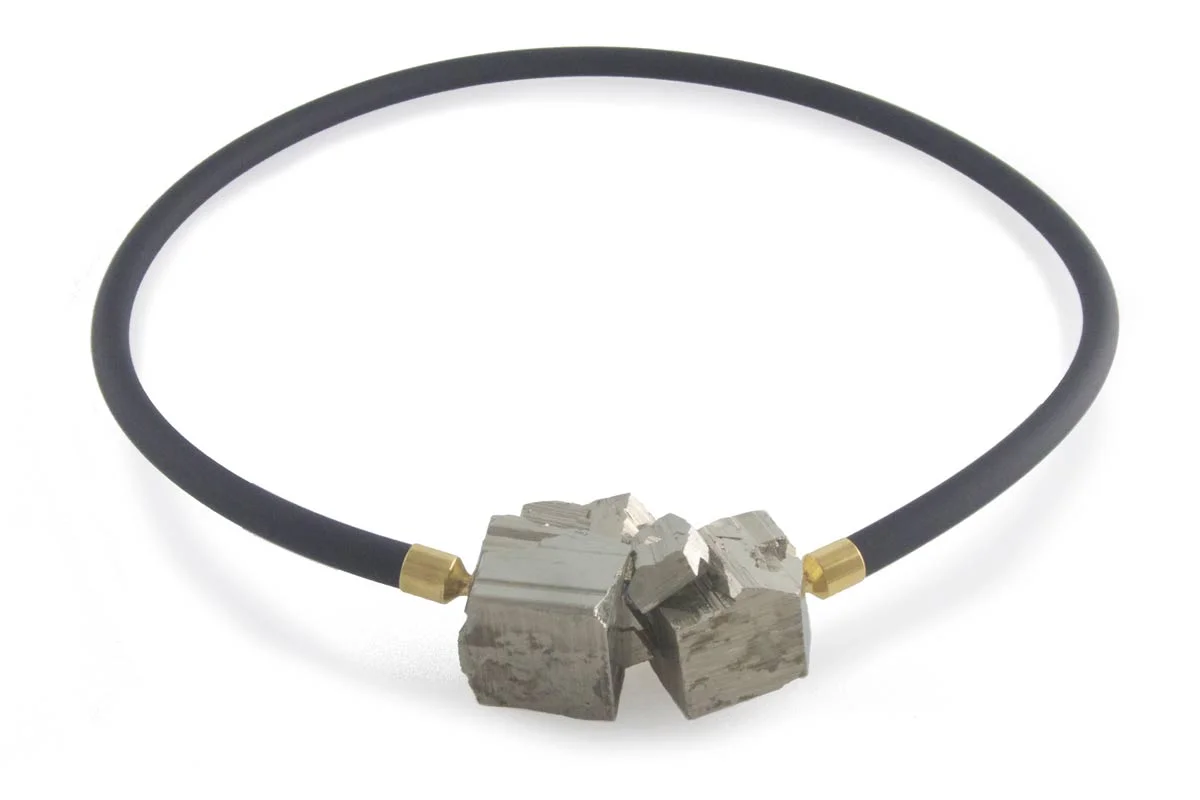 Double cub pyrite clasp on black rubber interchangeable necklace