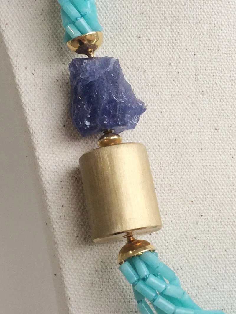 Amazonite multistrand necklace with tanzanite nugget and gold cylinder clasps connected by a gold adaptor - close up