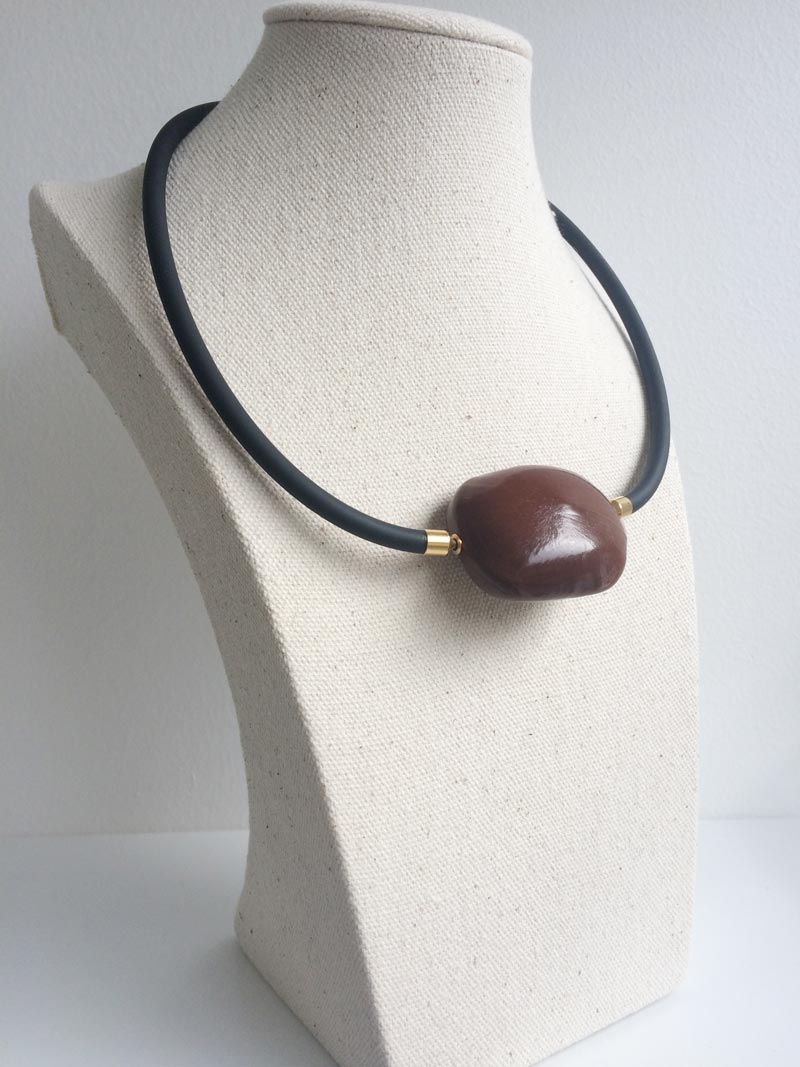 Black rubber necklace with sea bean clasp