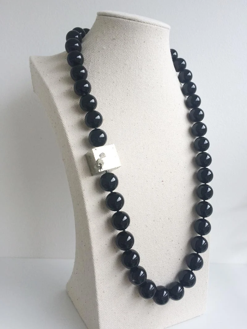 15mm onyx bead strand with pyrite clasp