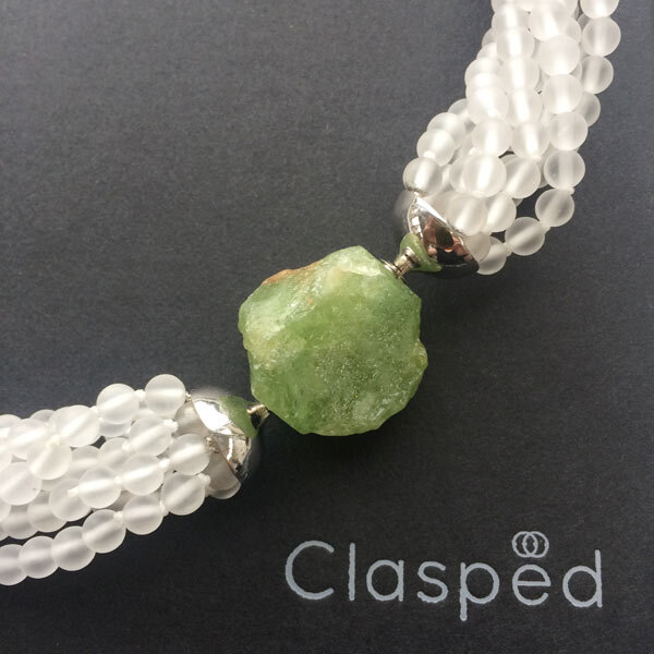 Matte rock crystal multistrand necklace with interchangeable rough tsavorite garnet clasp