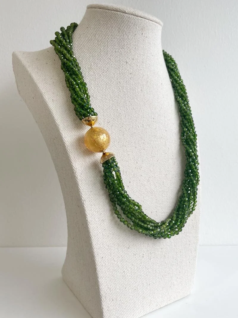 Faceted chrome diopside multistrand necklace with gold Murano glass clasp
