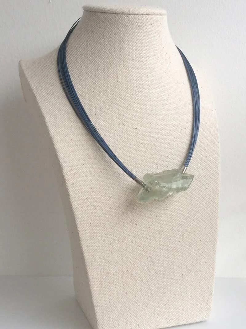 Praseolite interchangeable clasp on blue steel multistrand necklace