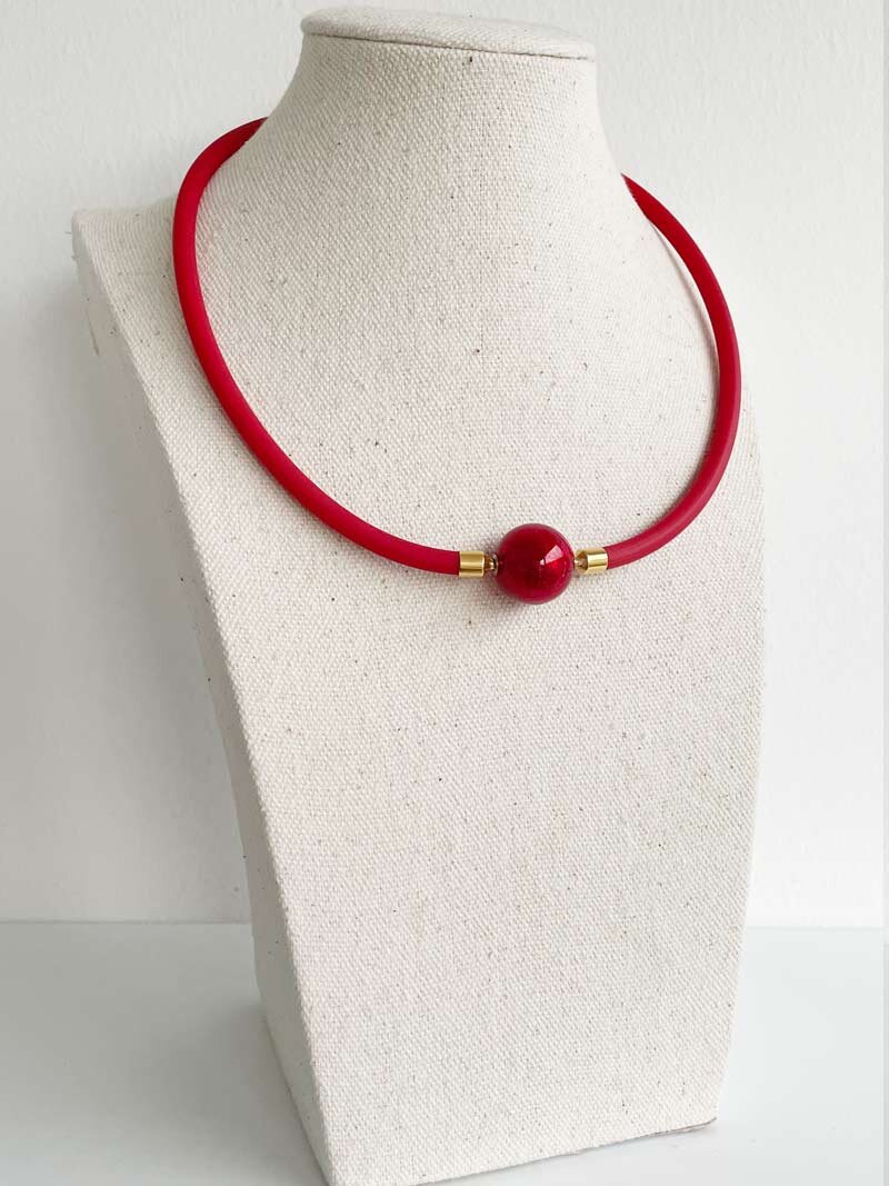 Red rubber with red Murano glass clasp