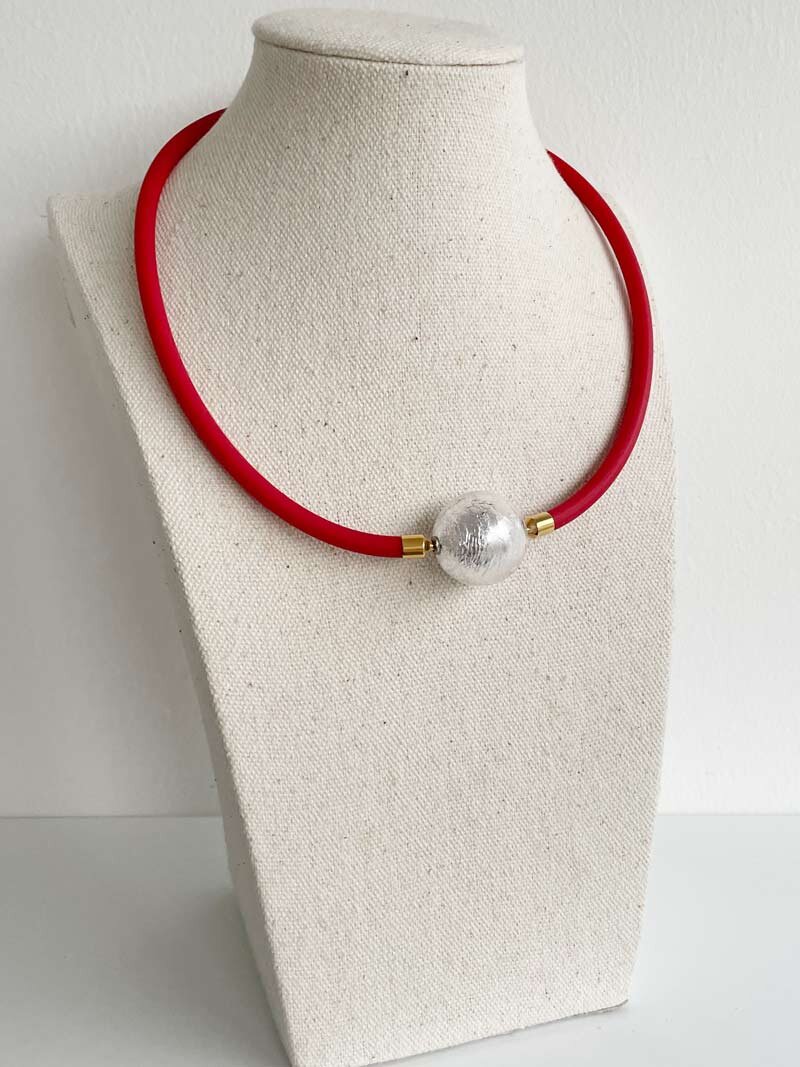 Red rubber with silver Murano glass clasp