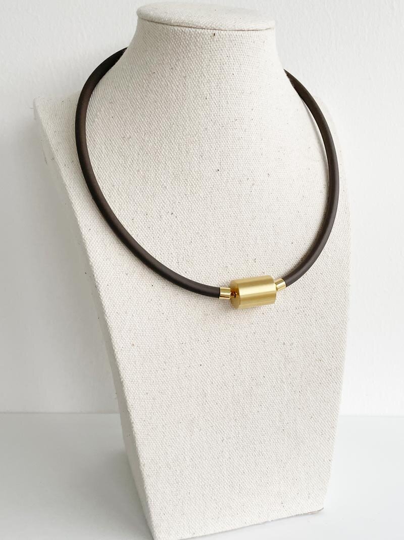 Brown rubber with gold cylinder clasp