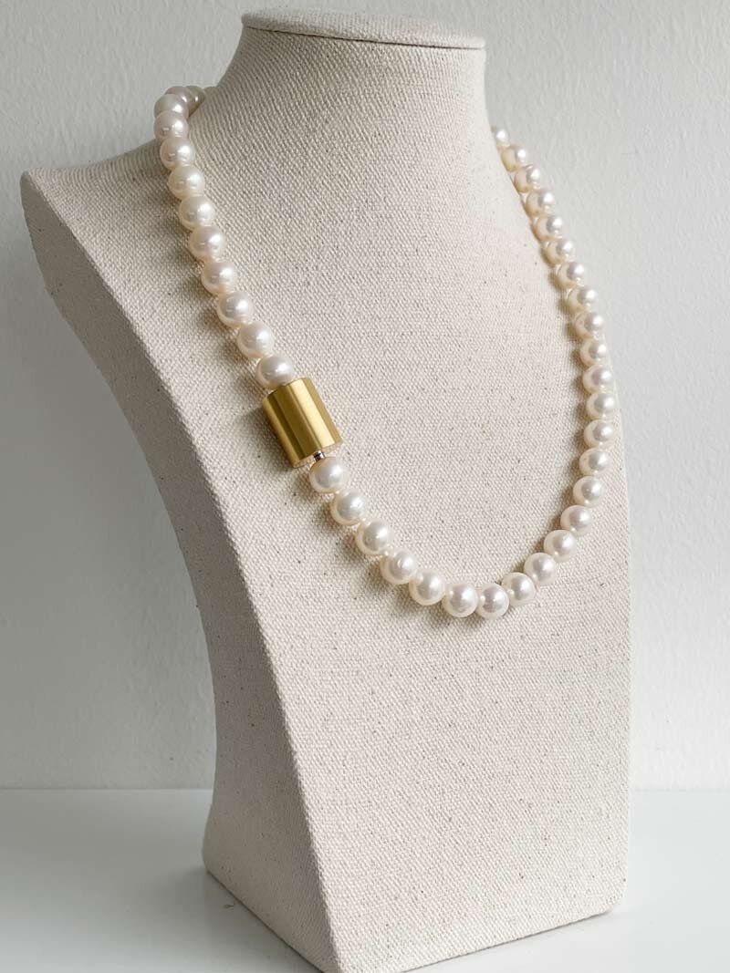 9-9.5mm cream pearls with large gold cylinder clasp