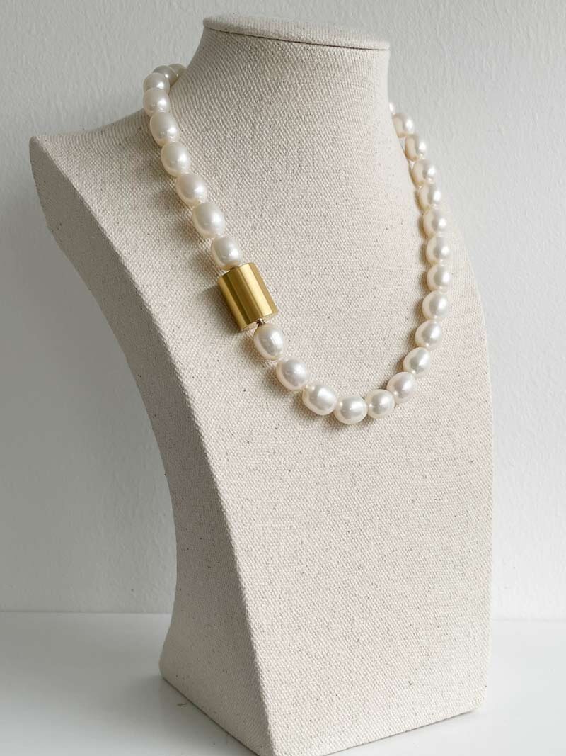 11-12mm oval pearl strand with gold cylinder clasp