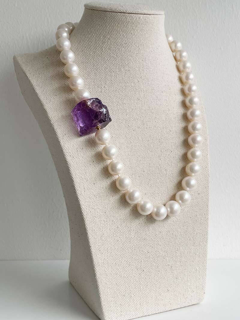 11-12mm round cream pearl with amethyst nugget clasp
