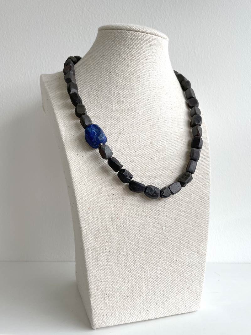 Hammered hematite obsidian necklace with hammered lapis feature clasp