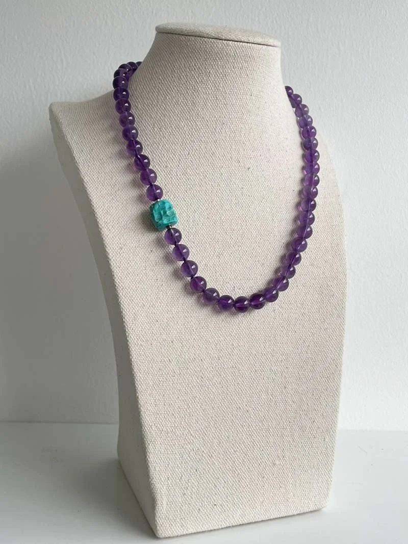 Turquoise-nugget-clasp-on-8mm-amethyst.jpg