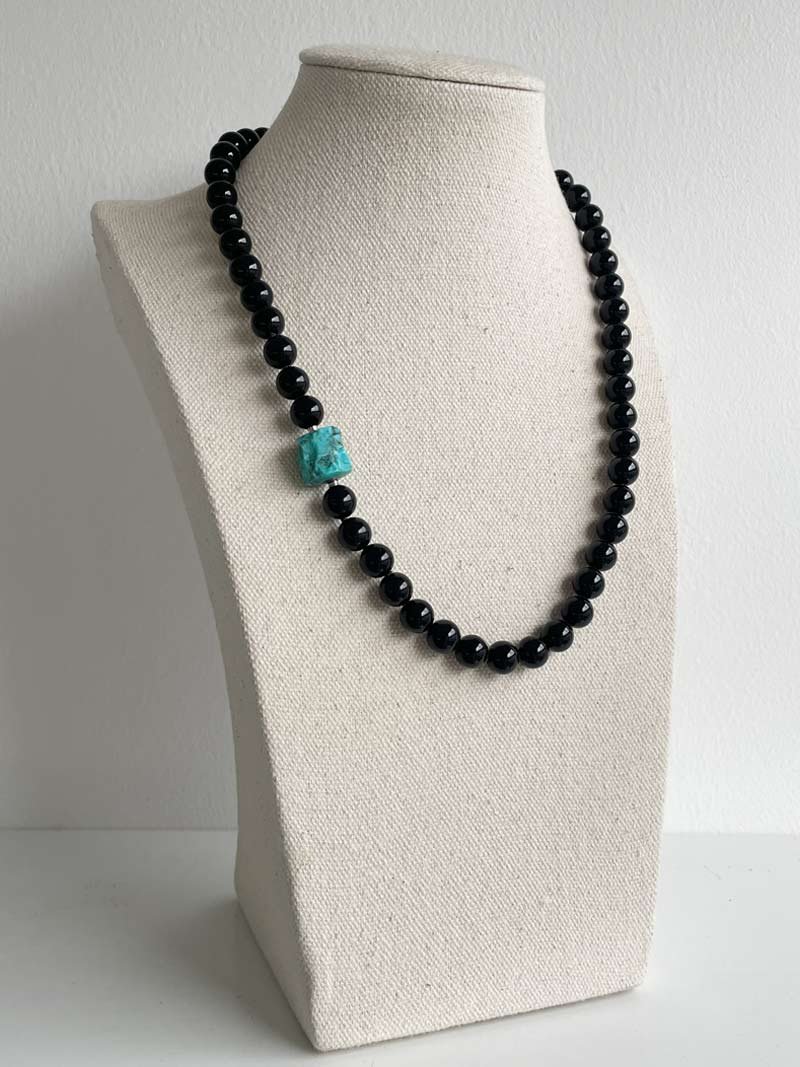Turquoise-nugget-clasp-on-8mm-onyx.jpg
