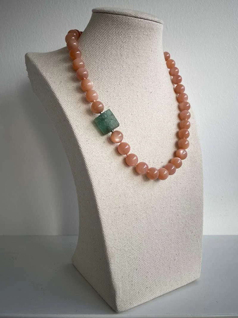 10mm orange moonstone necklace with interchangeable aquamarine nugget feature clasp - part of Clasped's interchangeable necklace system