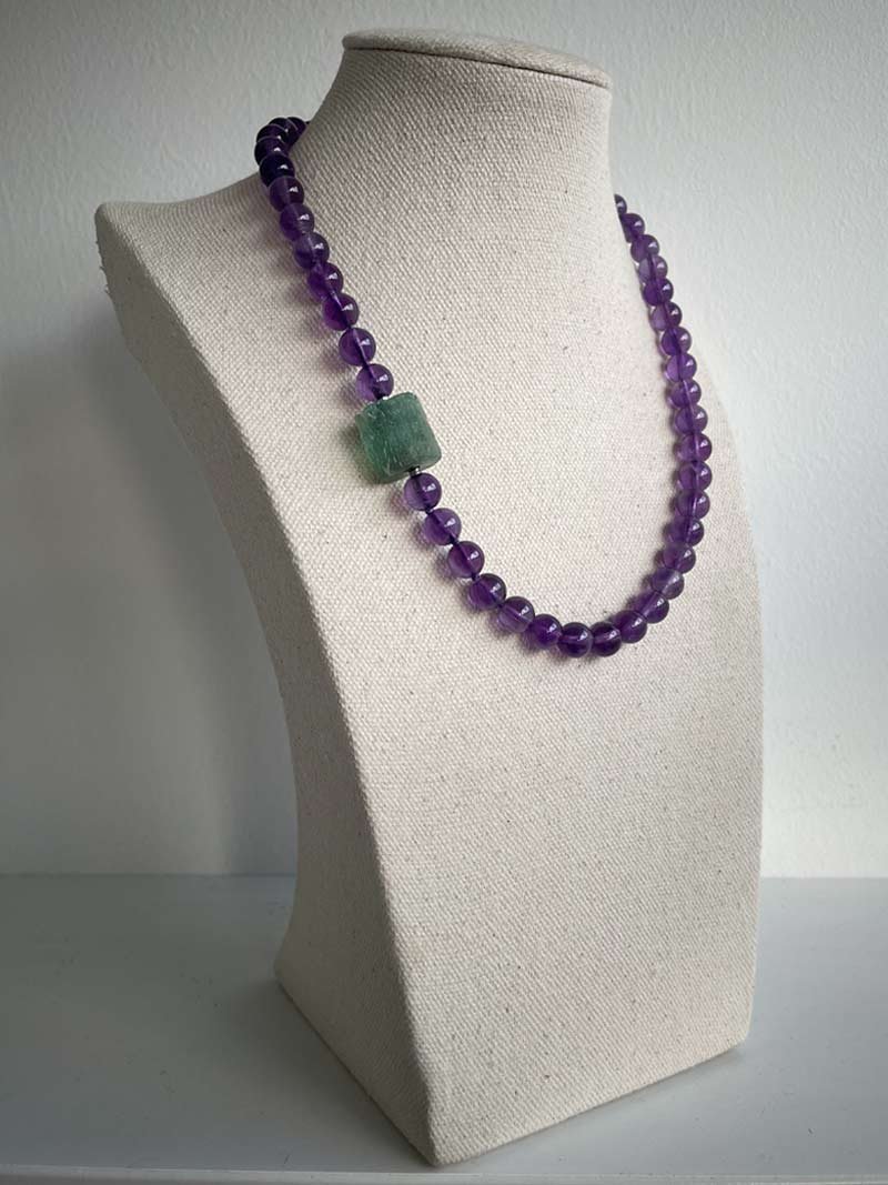 8mm amethyst bead necklace with interchangeable aquamarine nugget feature clasp - part of Clasped's interchangeable necklace system