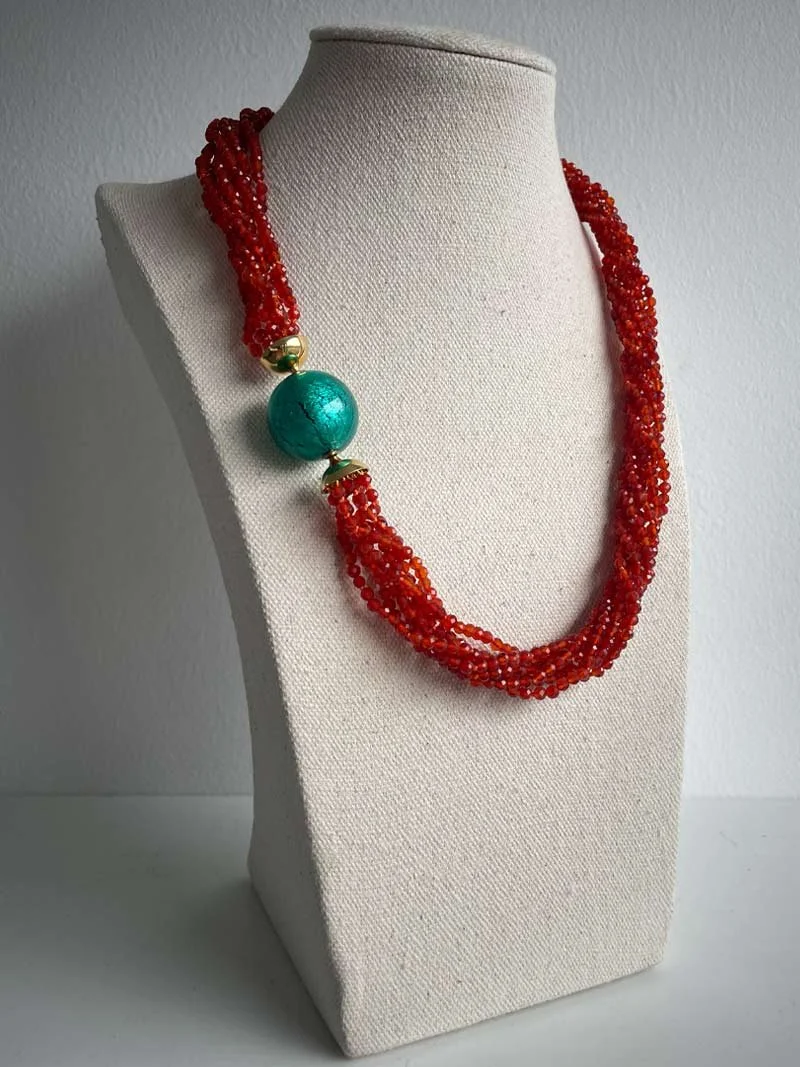 Faceted carnelian multistrand necklace with interchangeable blue green Murano glass feature clasp - part of Clasped's interchangeable necklace system