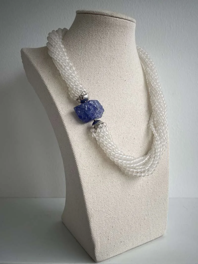Matte rock crystal multistrand necklace with interchangeable rough tanzanite feature clasp