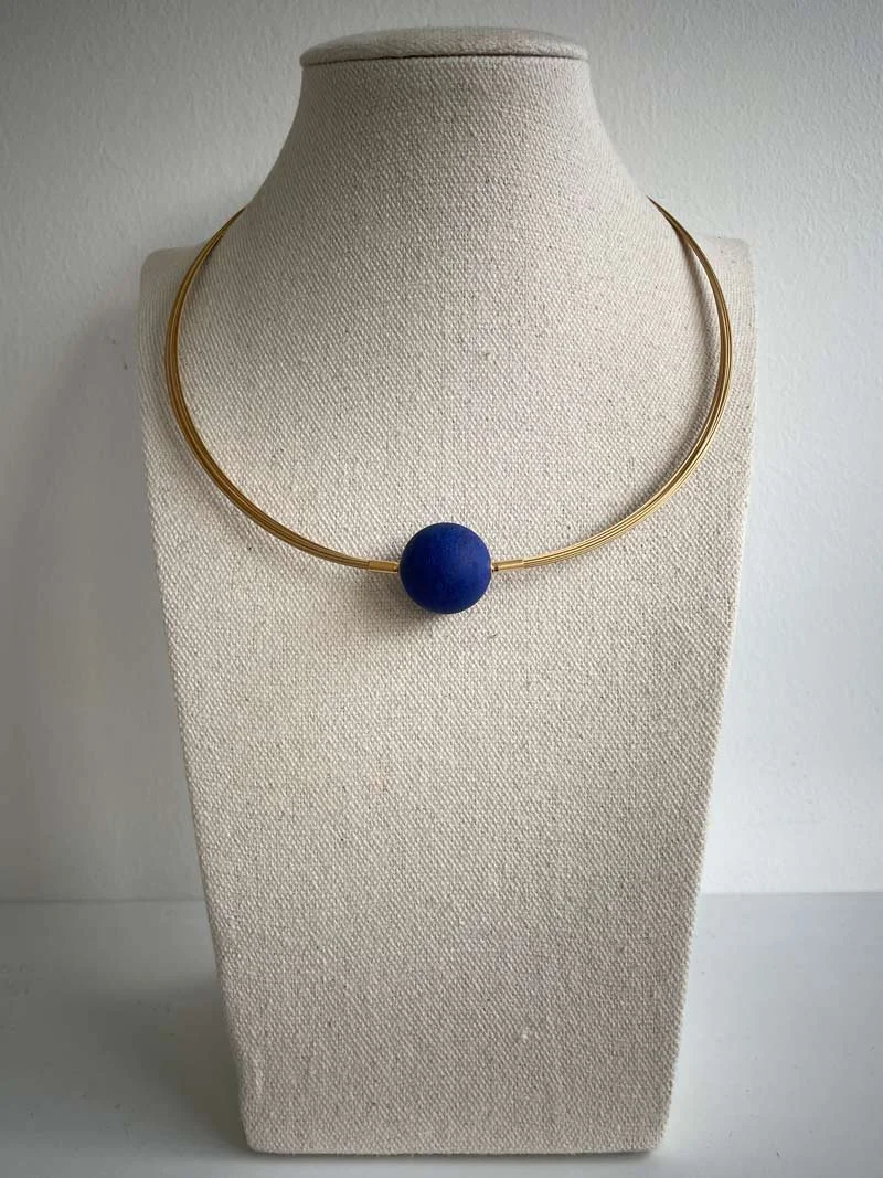 Gold plated steel wire multistrand necklace with interchangeable matte lapis feature clasp - part of Clasped's interchangeable necklace system