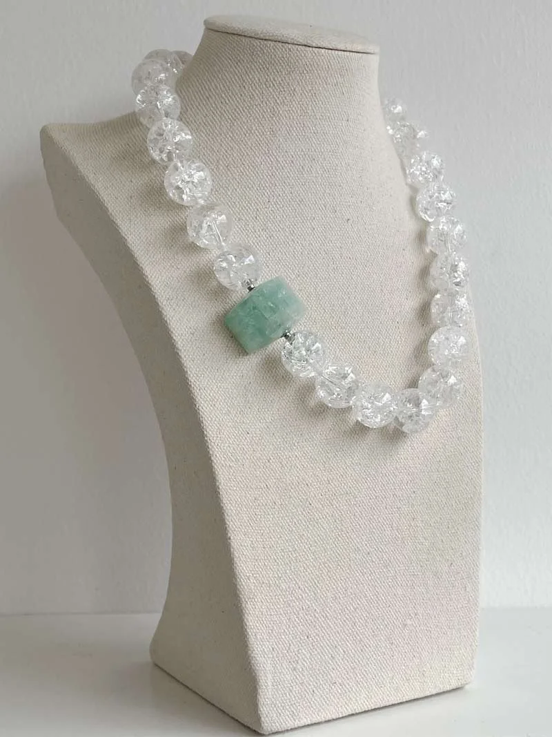 16mm crazed rock crystal bead strand with interchangeable triangular aquamarine feature clasp