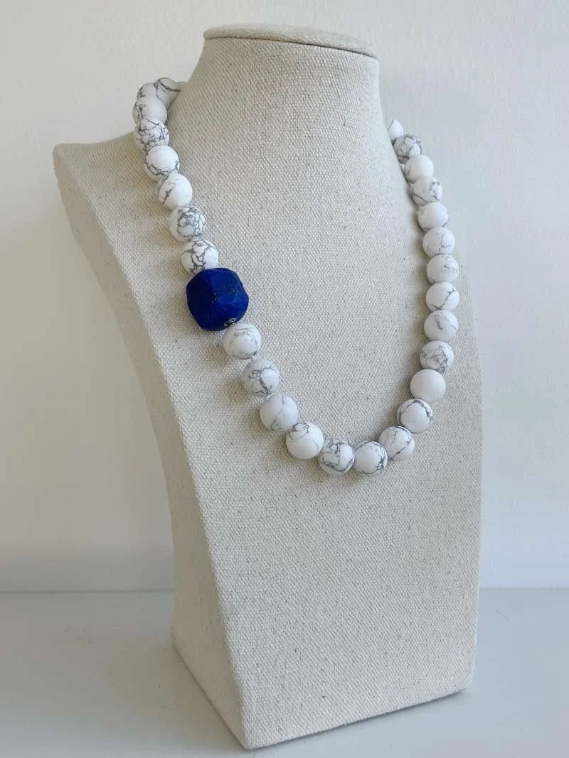 12mm matte howlite bead necklace with interchangeable navy blue lapis lazuli nugget feature clasp - one of Clasped's range of wholly interchangeable necklaces