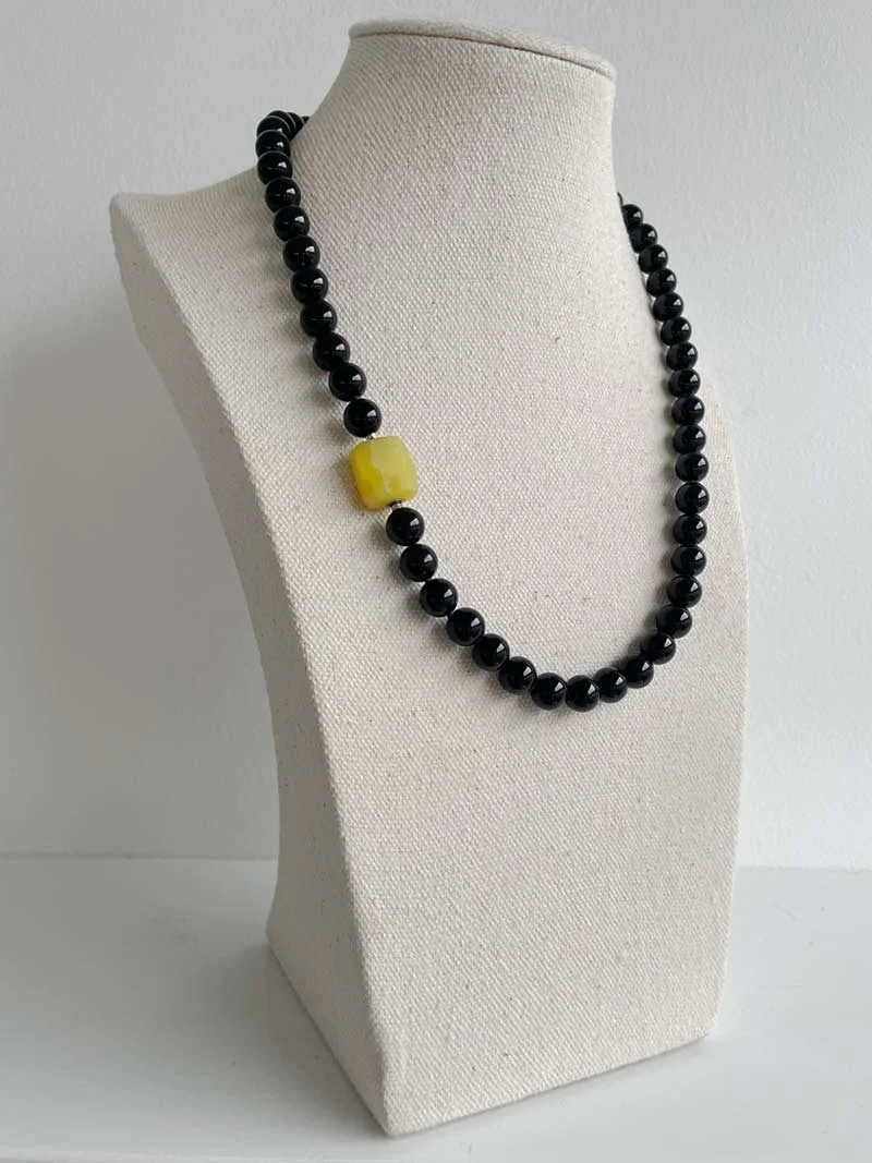 8mm black onyx round bead necklace with small interchangeable yellow agate nugget feature clasp