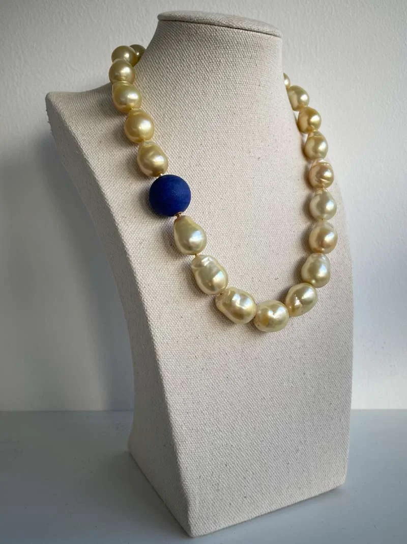Baroque golden south sea pearl necklace with interchangeable matte lapis feature clasp - part of Clasped's interchangeable necklace system