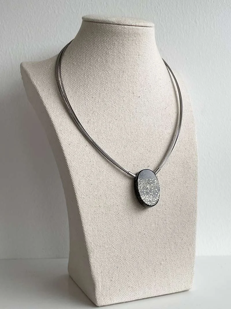 Interhcangeable oval slate pyrite clasp with steel wire multistrand necklace